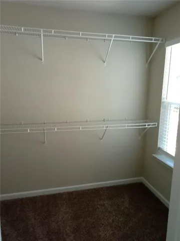 a view of a room with racks on the wall