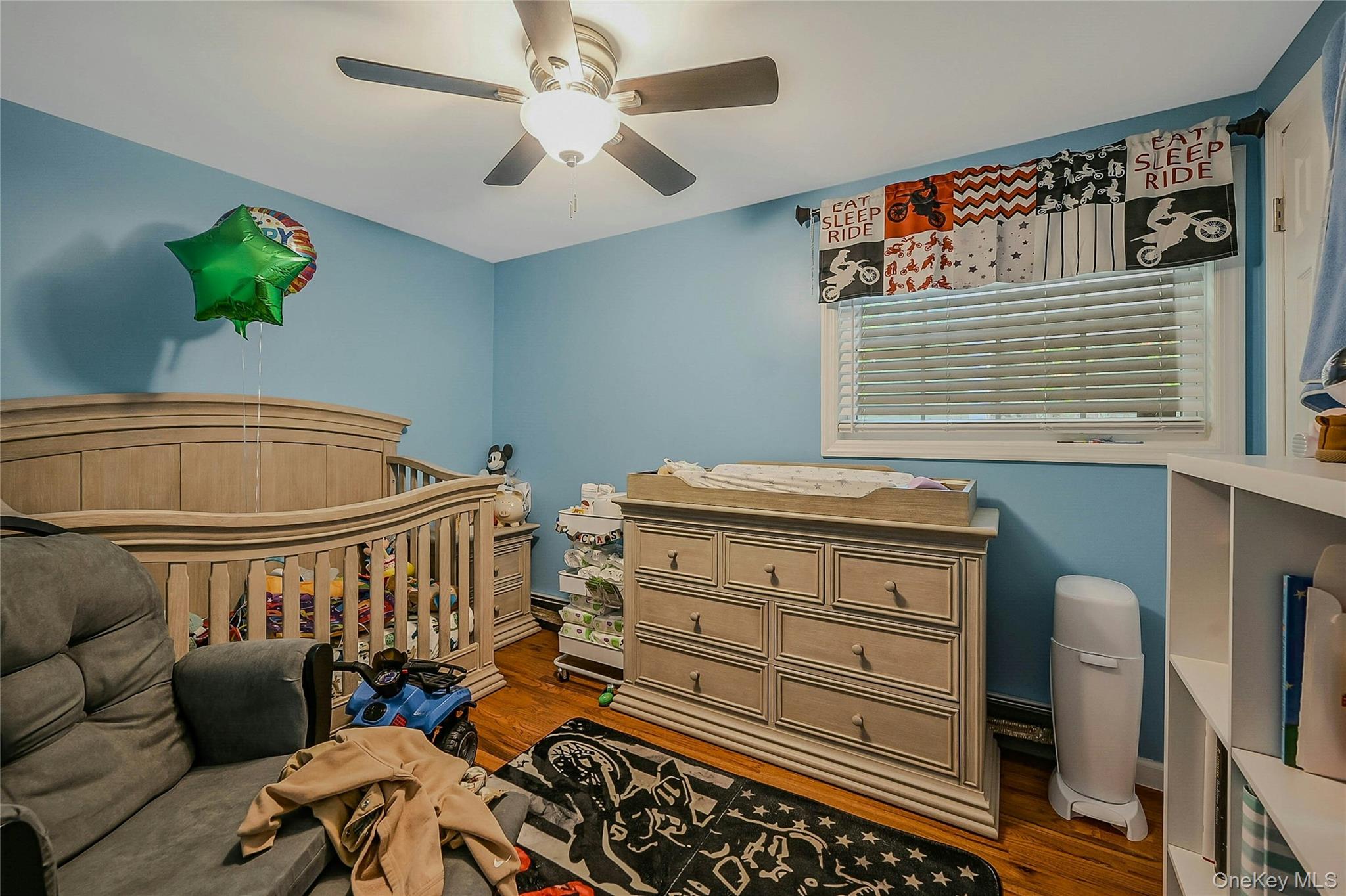 196 Church Drive Mastic Beach, NY 11951 - Photo 11 of 15 a bedroom with furniture and a window