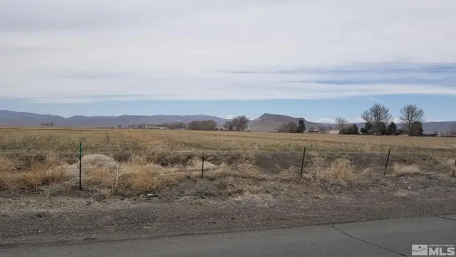 a view of a lake with a mountain in the background