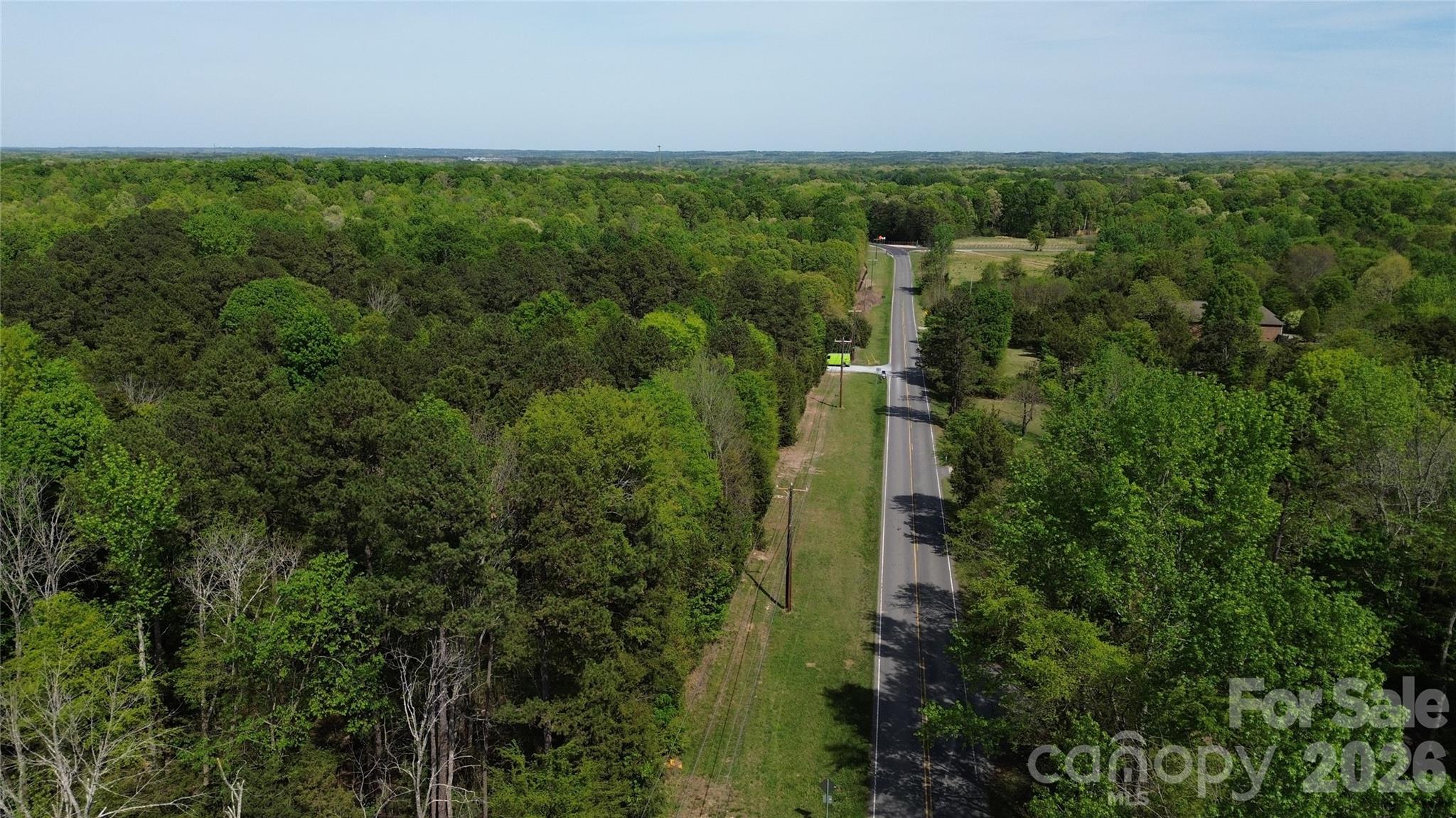 11901 Brief Road Charlotte, NC 28227 - Photo 8 of 9 an aerial view of a house with a yard