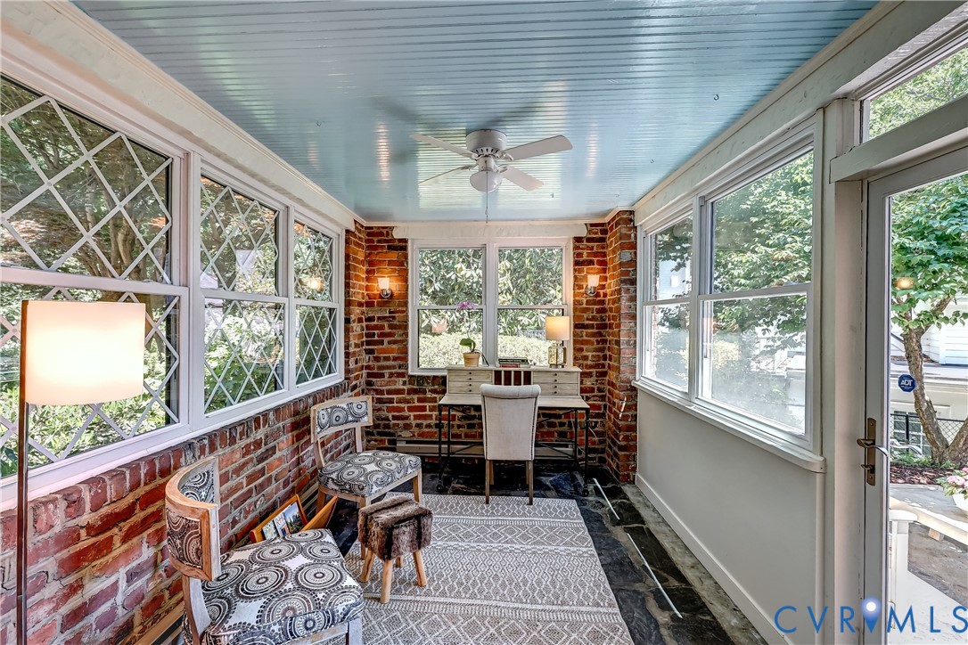4814 Riverside Drive Richmond, VA 23225 - Photo 12 of 39 a view of a room with wooden floor and furniture