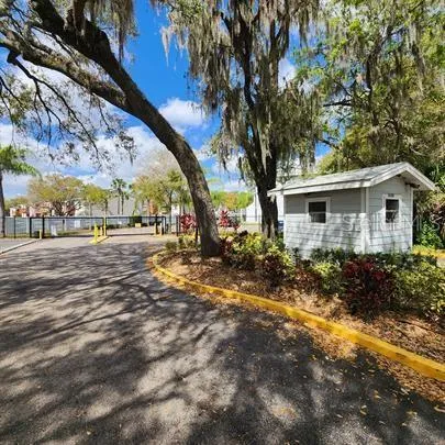 a view of a balcony with a pot