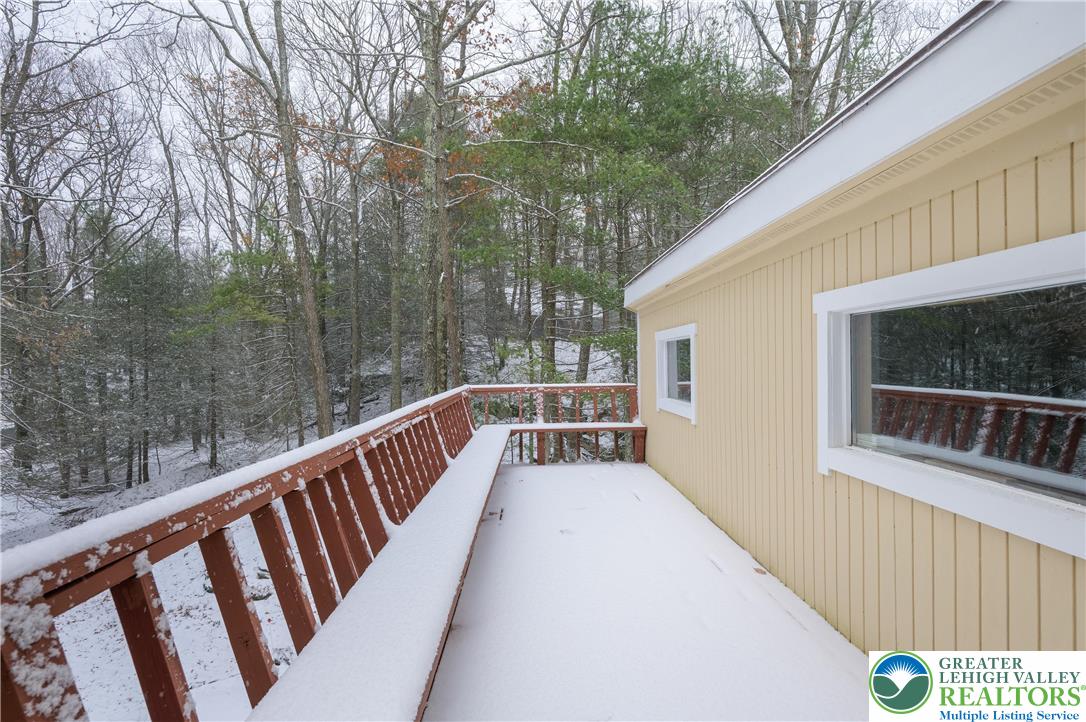 169 Shiny Mountain Road Greentown, PA 18426 - Photo 11 of 54 a view of a balcony with yard