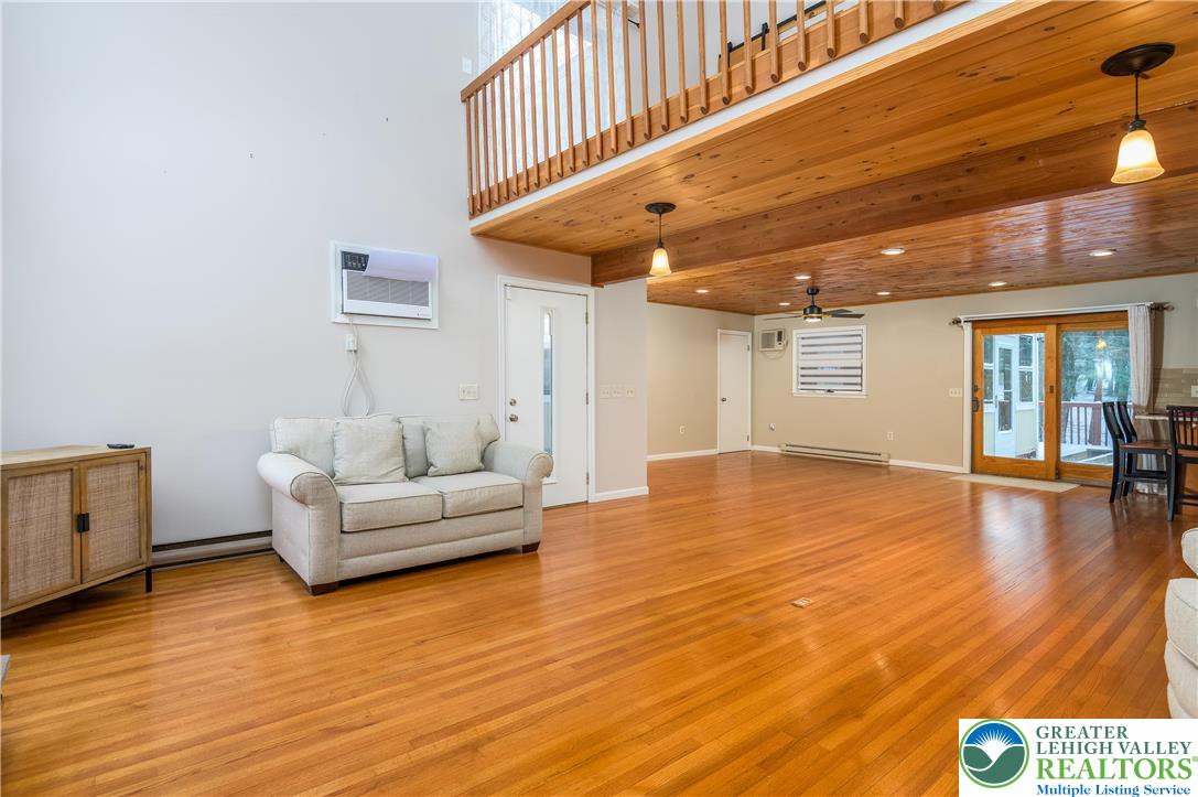 169 Shiny Mountain Road Greentown, PA 18426 - Photo 14 of 54 a view of livingroom with furniture and wooden floor