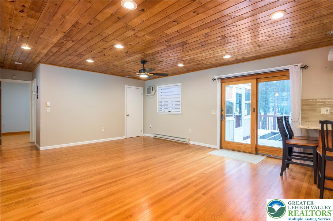 169 Shiny Mountain Road Greentown, PA 18426 - Photo 15 of 54 a view of an empty room with glass door