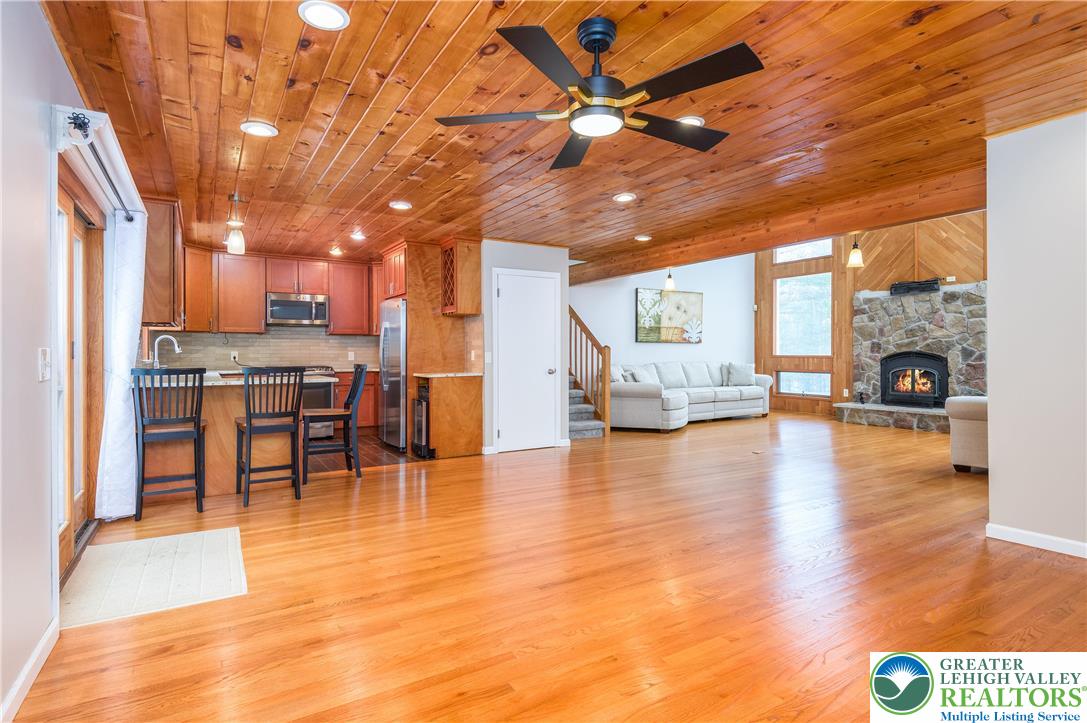169 Shiny Mountain Road Greentown, PA 18426 - Photo 16 of 54 a view of a kitchen with furniture and a table
