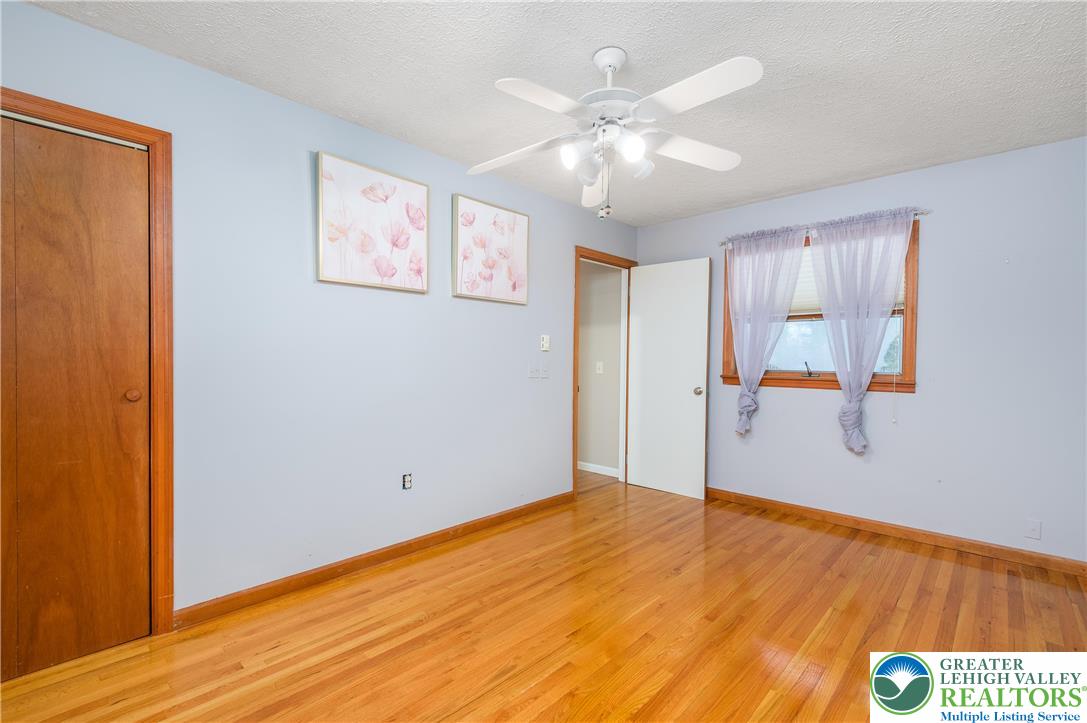 169 Shiny Mountain Road Greentown, PA 18426 - Photo 27 of 54 a view of an empty room with wooden floor