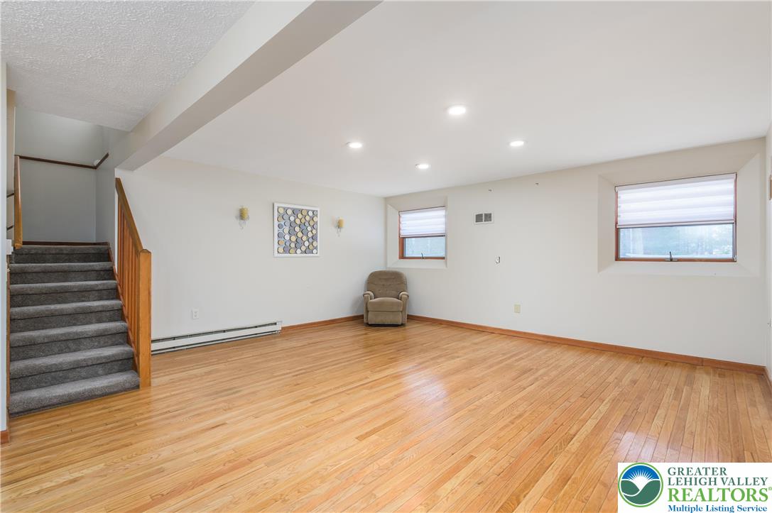 169 Shiny Mountain Road Greentown, PA 18426 - Photo 29 of 54 a view of an empty room with wooden floor and a window