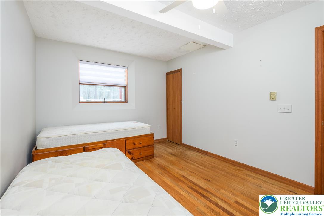 169 Shiny Mountain Road Greentown, PA 18426 - Photo 36 of 54 a view of a room with wooden floor and a window