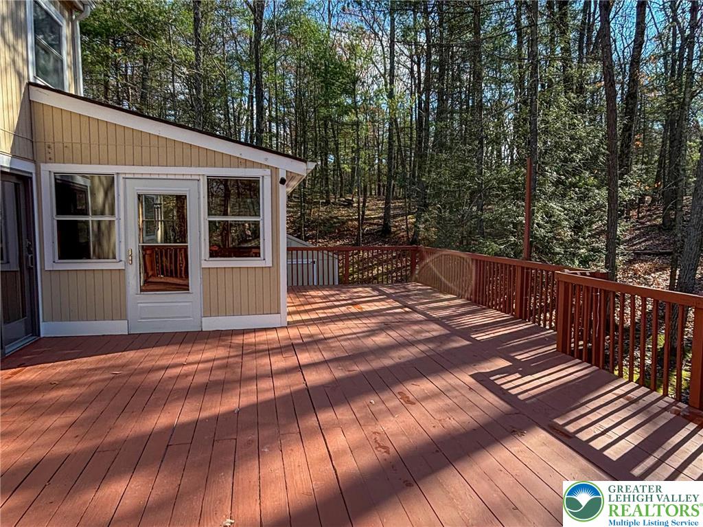 169 Shiny Mountain Road Greentown, PA 18426 - Photo 42 of 54 a view of a house with backyard and sitting area