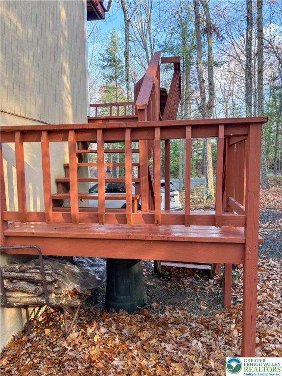 169 Shiny Mountain Road Greentown, PA 18426 - Photo 44 of 54 a view of a wooden house with a yard