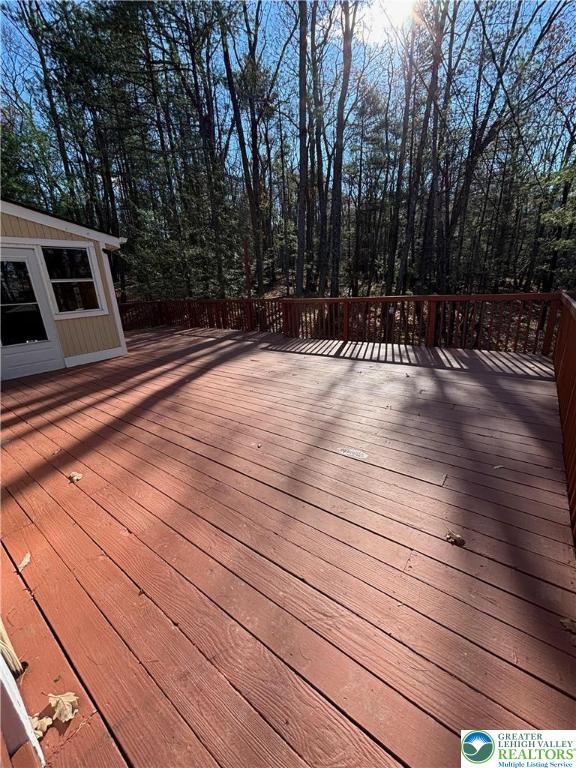 169 Shiny Mountain Road Greentown, PA 18426 - Photo 47 of 54 a view of a tennis court with trees in the background