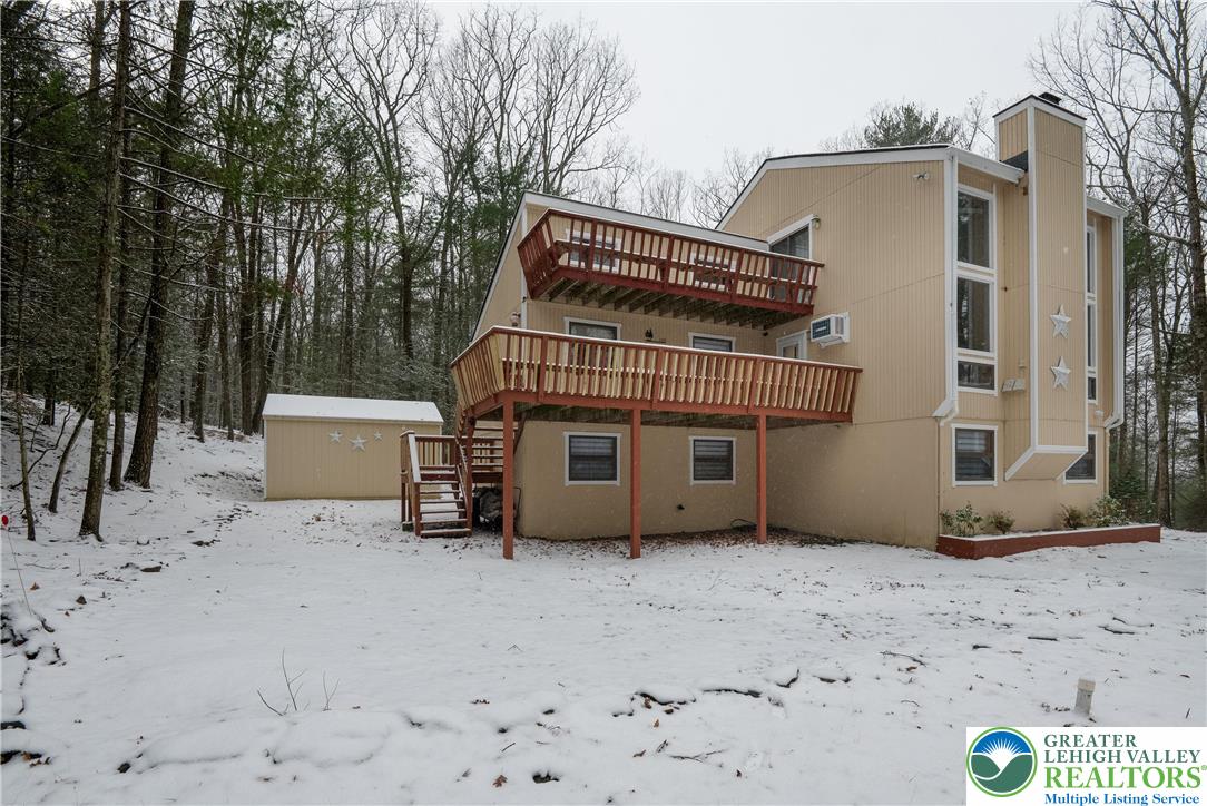 169 Shiny Mountain Road Greentown, PA 18426 - Photo 7 of 54 a view of a house with a yard