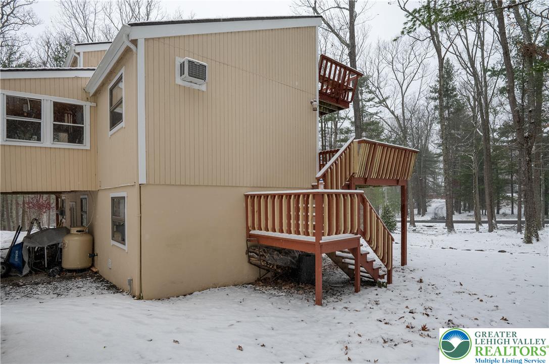 169 Shiny Mountain Road Greentown, PA 18426 - Photo 8 of 54 a view of outdoor space with deck and a garden