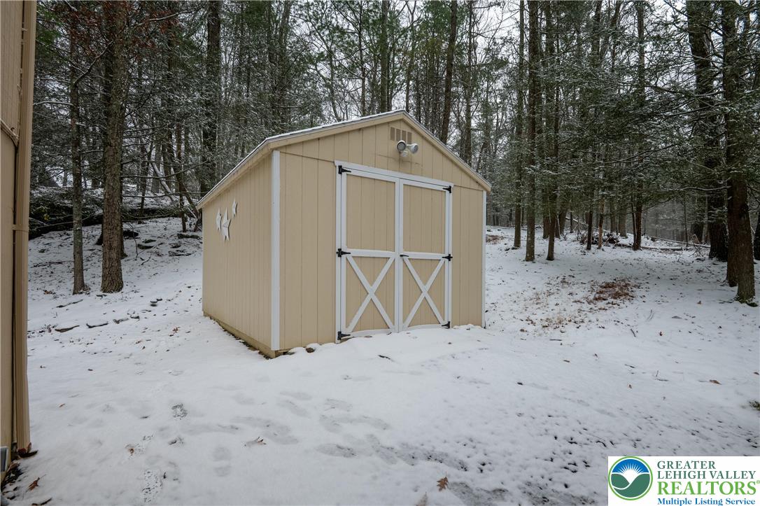 169 Shiny Mountain Road Greentown, PA 18426 - Photo 9 of 54 a view of backyard with snow