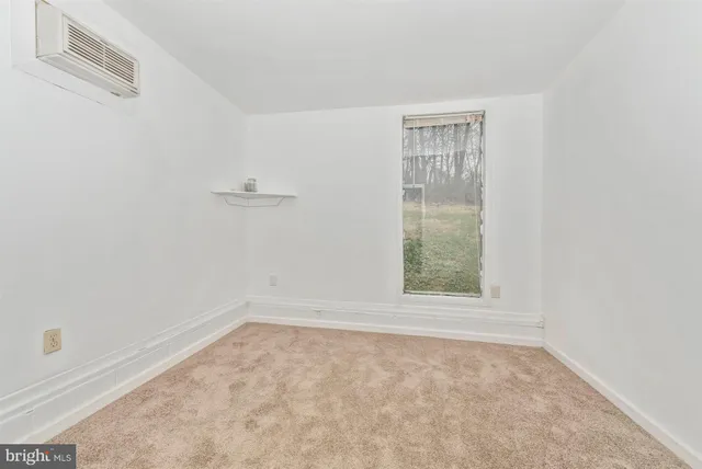 an empty room with a window