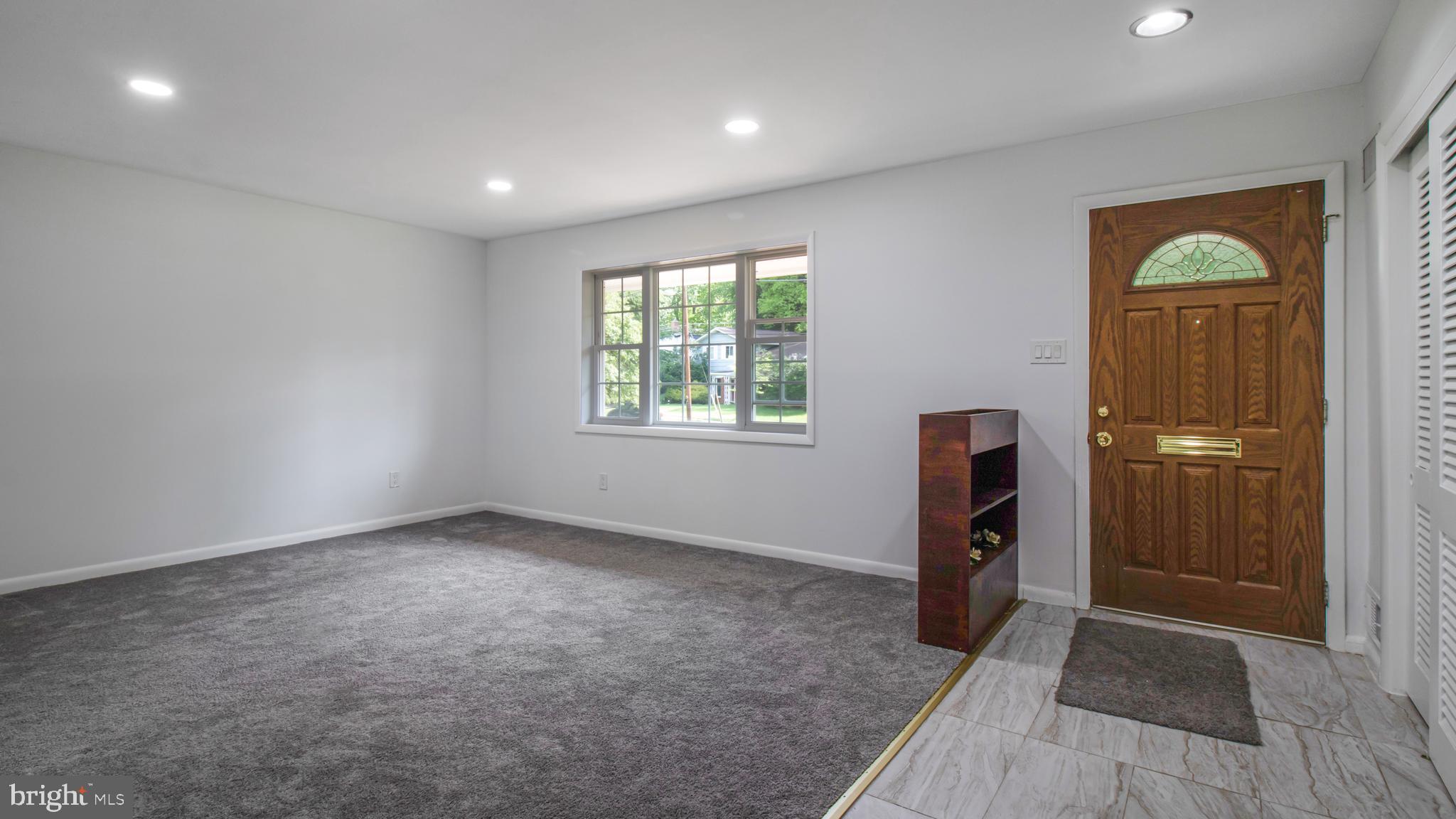 10310 Royal Road Silver Spring, MD 20903 - Photo 2 of 61 an empty room with closet and windows