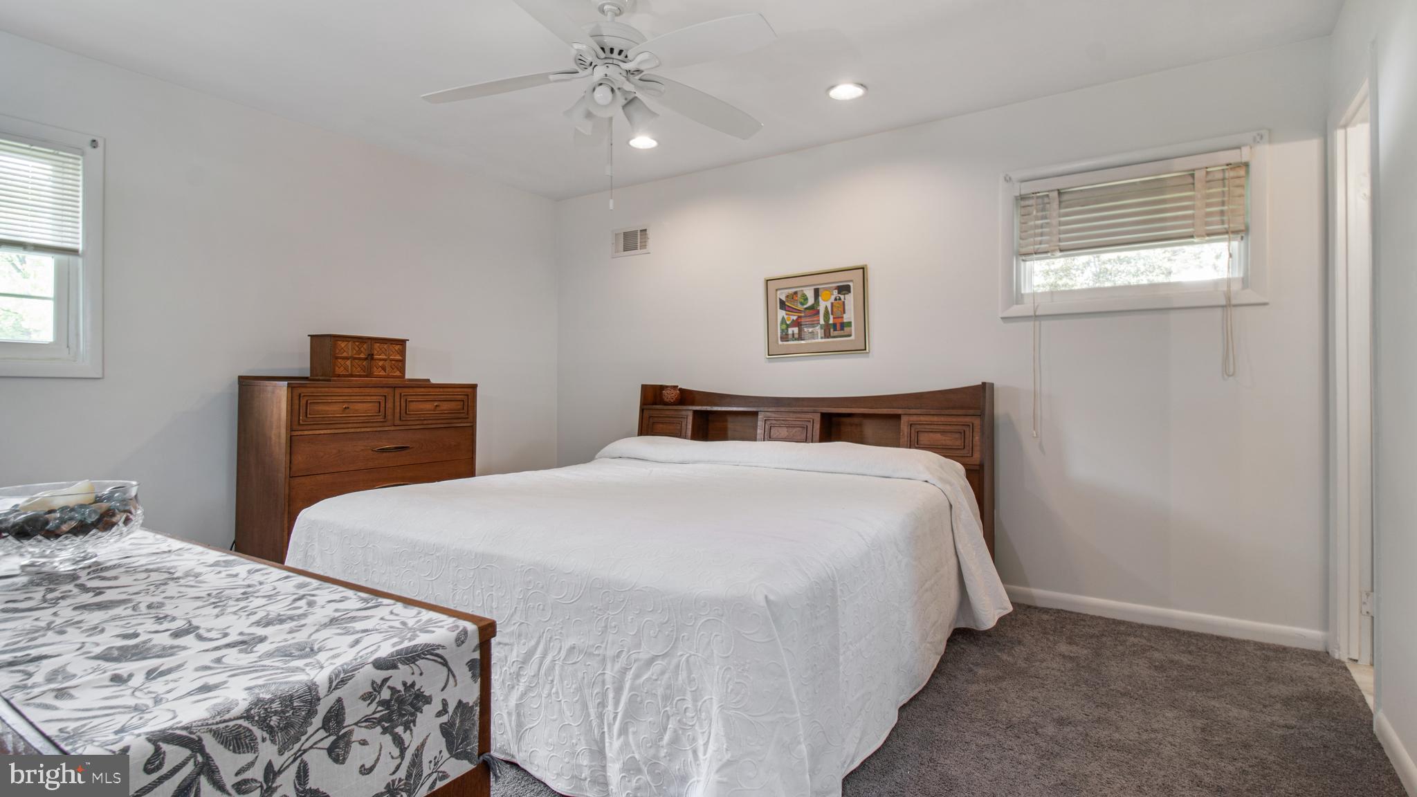 10310 Royal Road Silver Spring, MD 20903 - Photo 25 of 61 a bedroom with bed and window