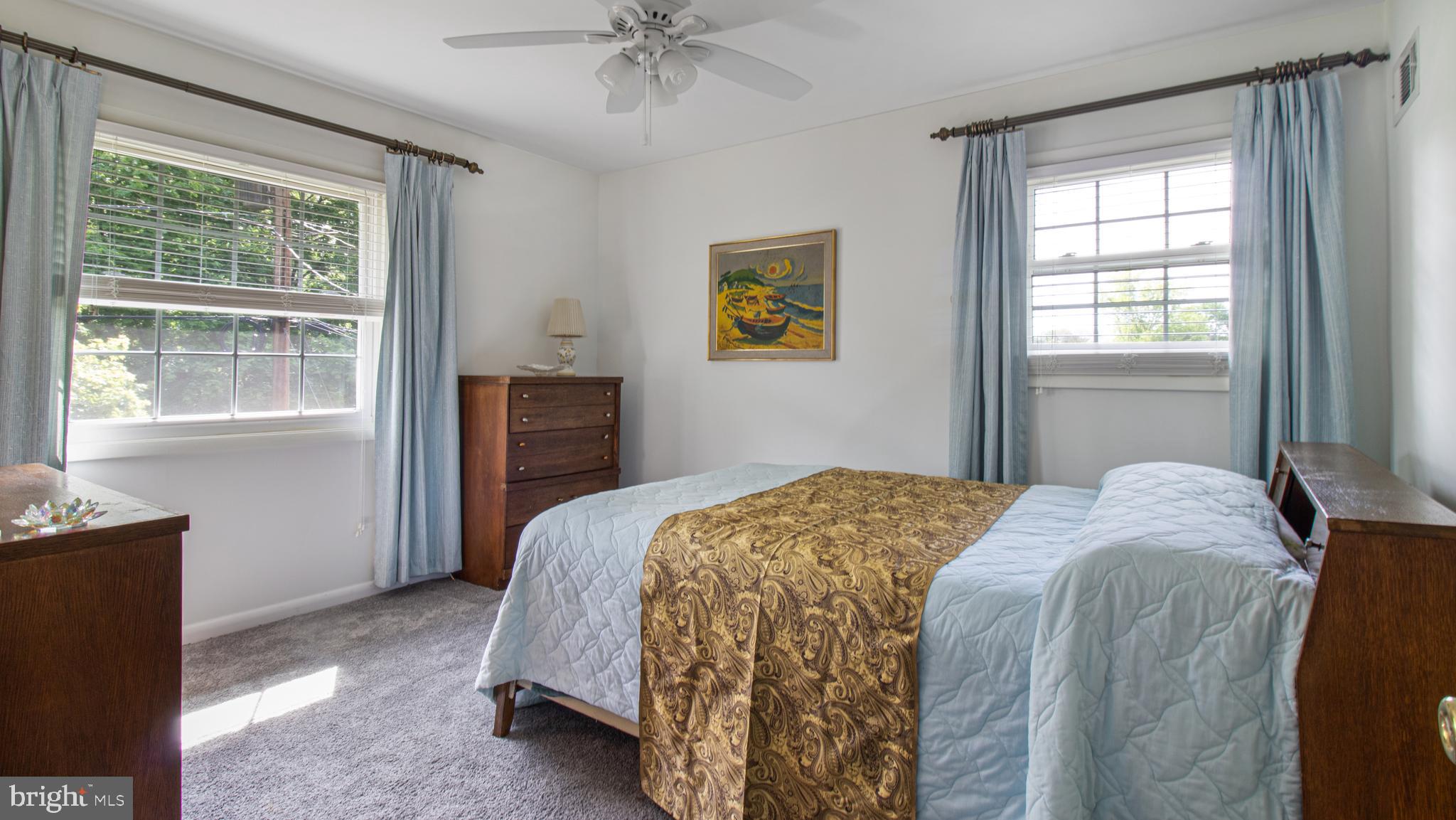 10310 Royal Road Silver Spring, MD 20903 - Photo 29 of 61 a bedroom with a bed and a window