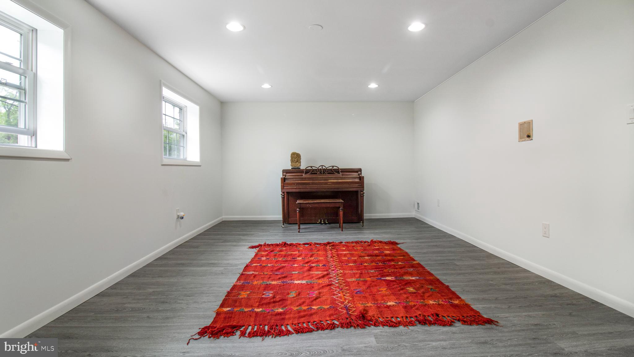 10310 Royal Road Silver Spring, MD 20903 - Photo 37 of 61 a living room with a rug and a rug