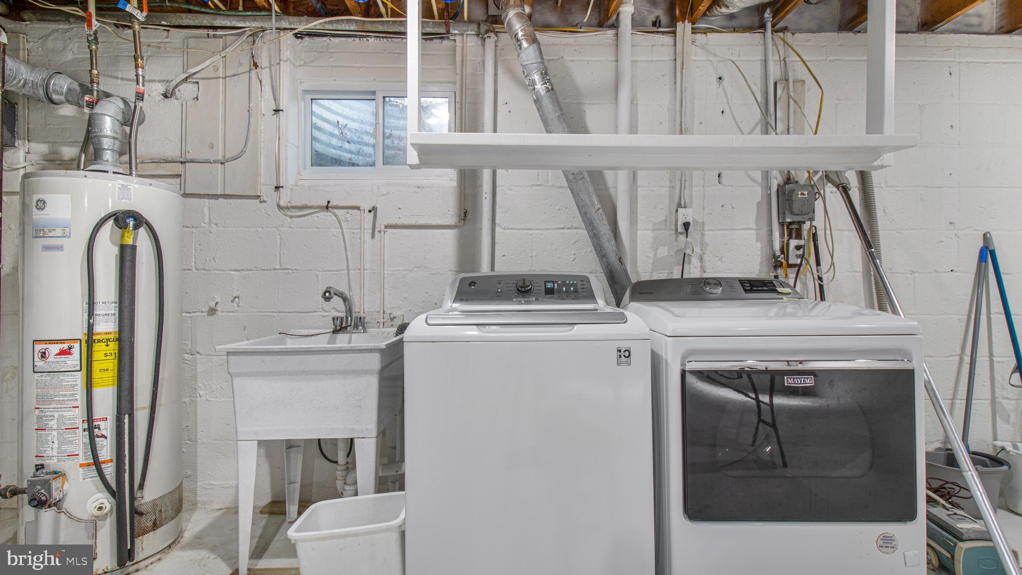 10310 Royal Road Silver Spring, MD 20903 - Photo 44 of 61 a utility room with dryer and washer
