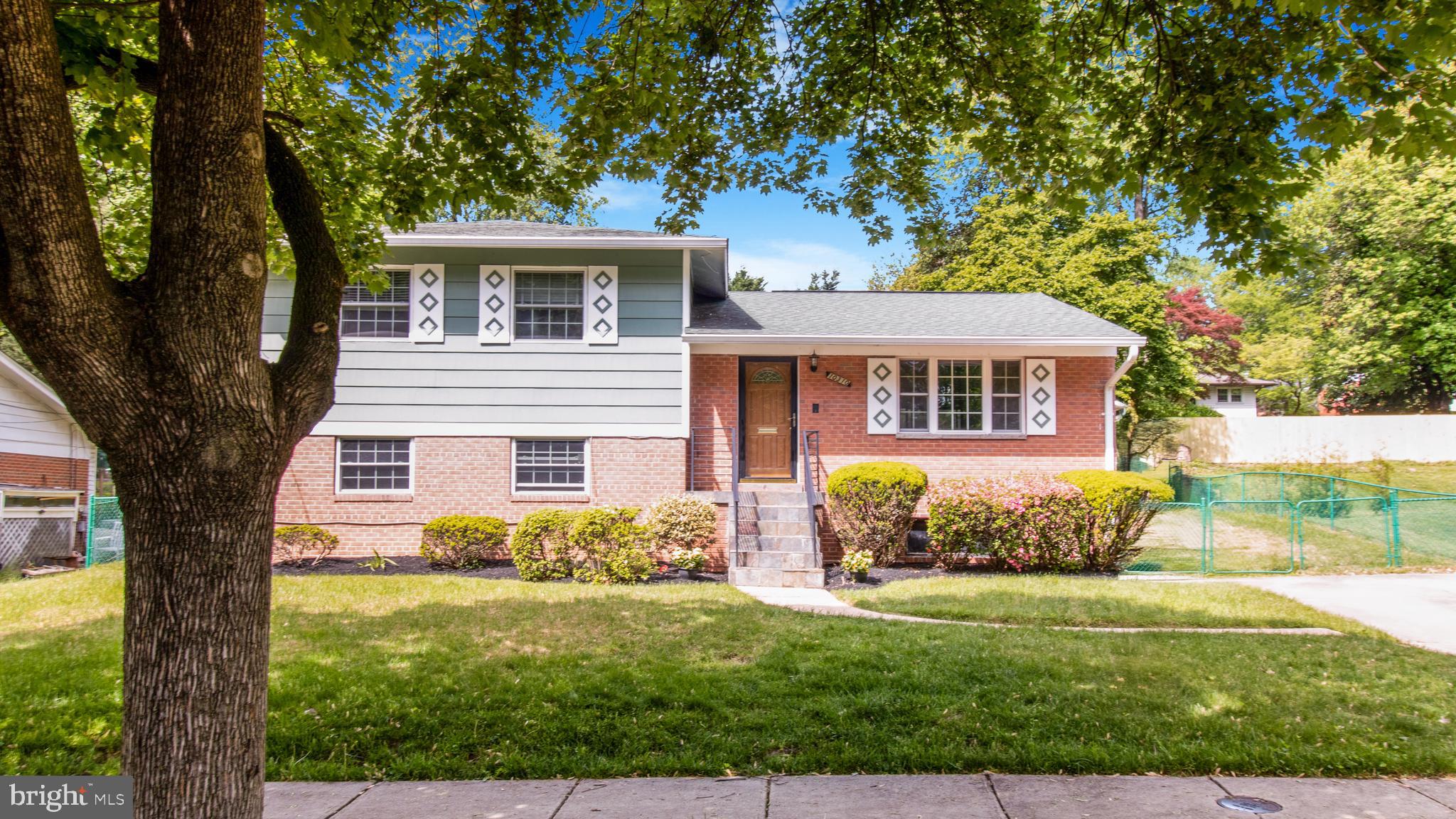 10310 Royal Road Silver Spring, MD 20903 - Photo 51 of 61 a front view of a house with garden