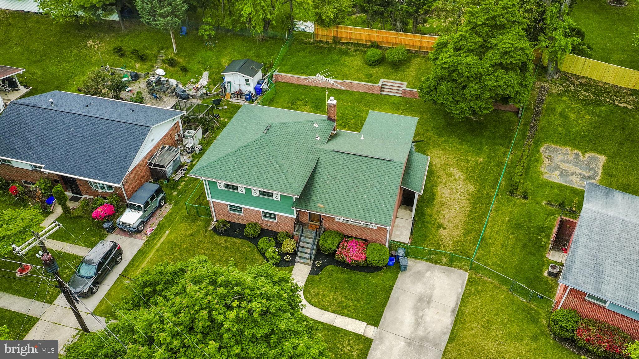 10310 Royal Road Silver Spring, MD 20903 - Photo 52 of 61 an aerial view of a house with a yard basket ball court and outdoor seating