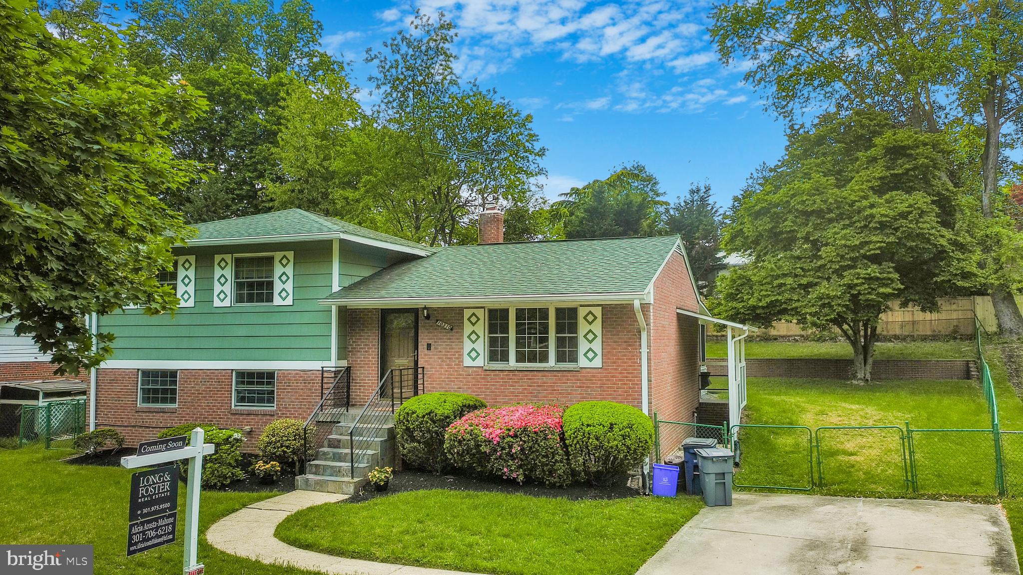 10310 Royal Road Silver Spring, MD 20903 - Photo 59 of 61 a front view of a house with garden