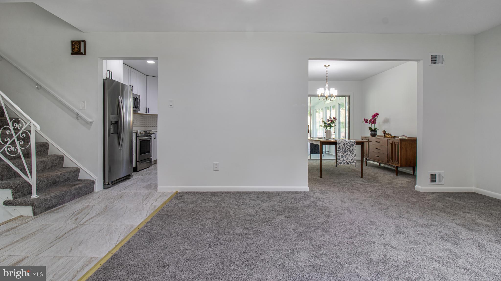 10310 Royal Road Silver Spring, MD 20903 - Photo 8 of 61 a view of livingroom with furniture and staircase