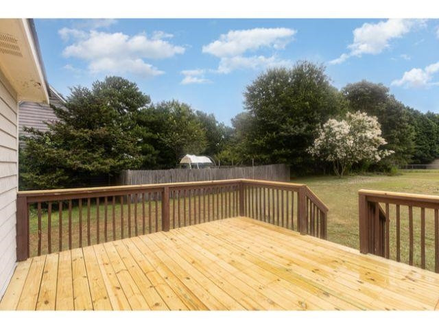 608 Perry Howard Road Fuquay-Varina, NC 27526 - Photo 19 of 21 a view of wooden deck
