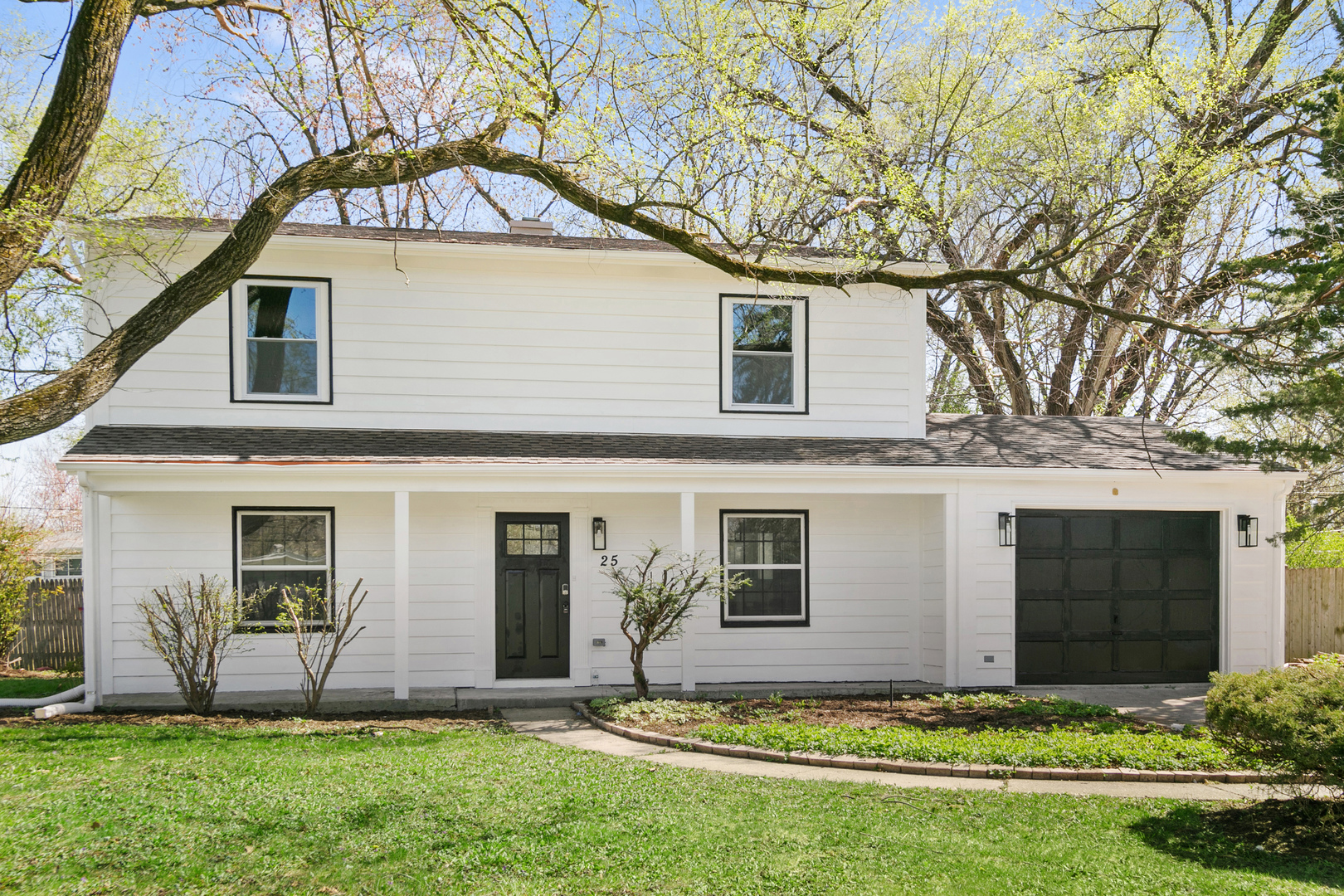 25 Long Beach Road Montgomery, IL 60538 - Photo 1 of 21 front view of a house with a yard