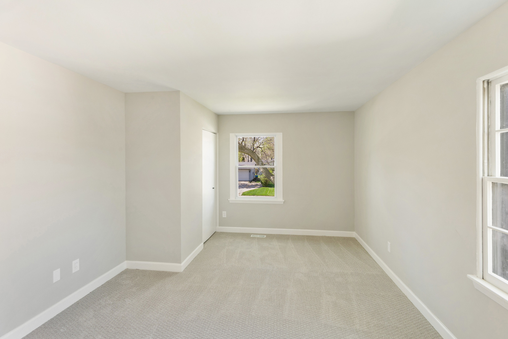 25 Long Beach Road Montgomery, IL 60538 - Photo 13 of 21 an empty room with windows