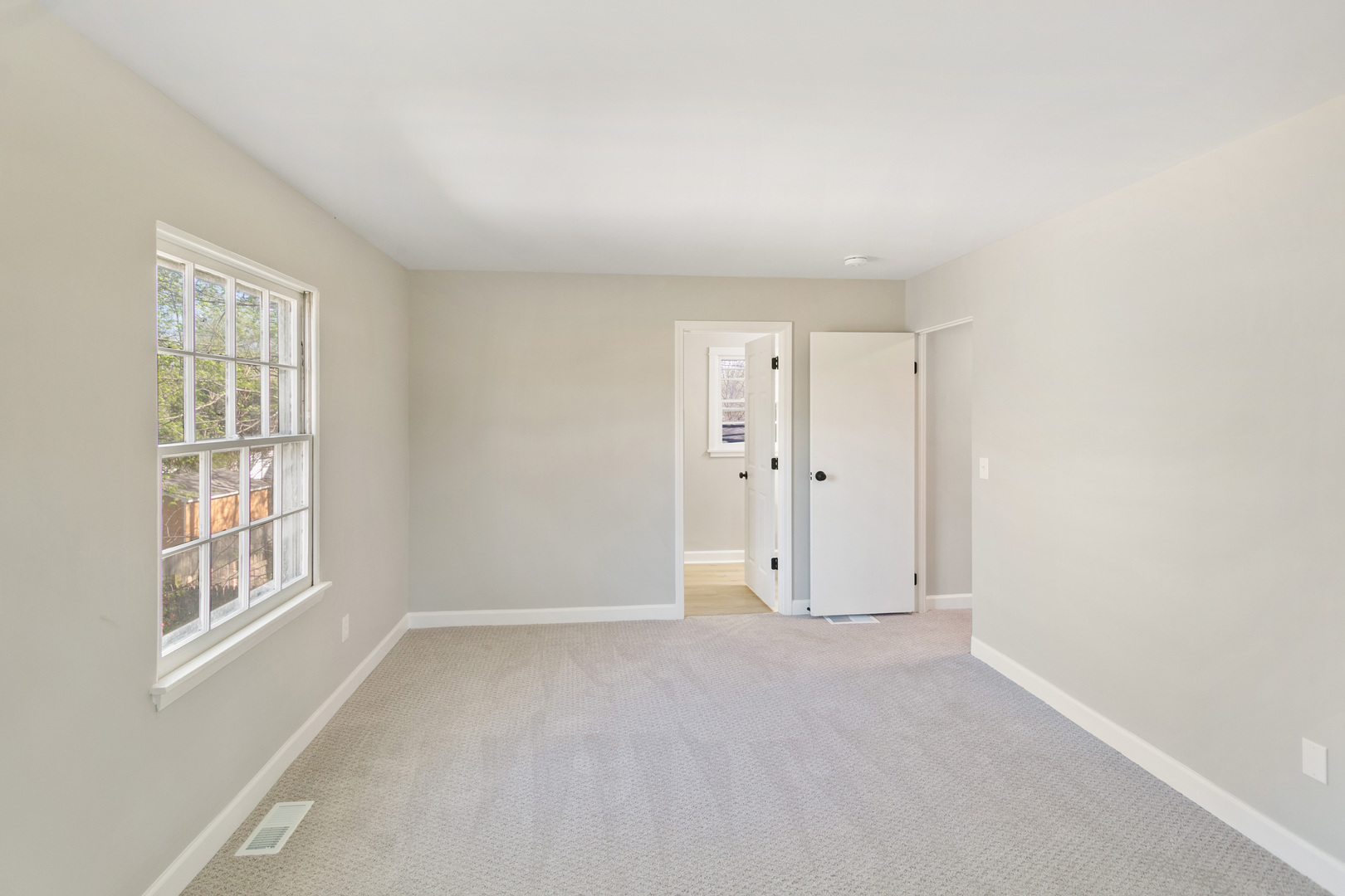 25 Long Beach Road Montgomery, IL 60538 - Photo 14 of 21 a view of an empty room with a window
