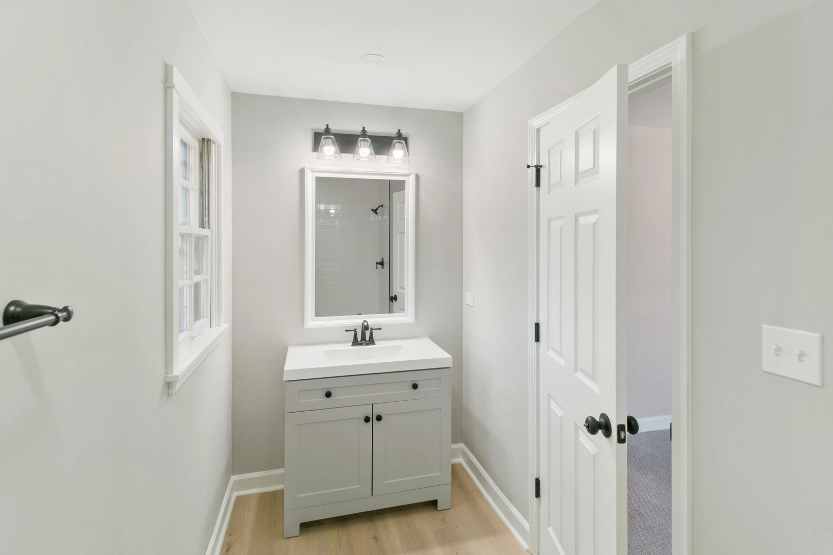25 Long Beach Road Montgomery, IL 60538 - Photo 16 of 21 a spacious bathroom with a double vanity sink a mirror and a