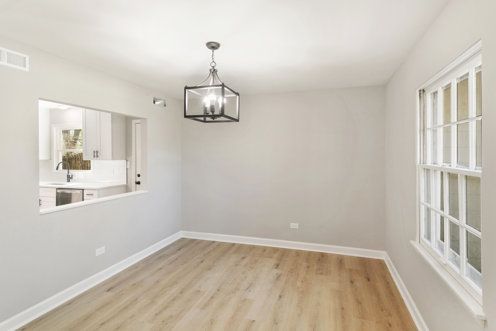 25 Long Beach Road Montgomery, IL 60538 - Photo 2 of 21 a view of empty room with wooden floor