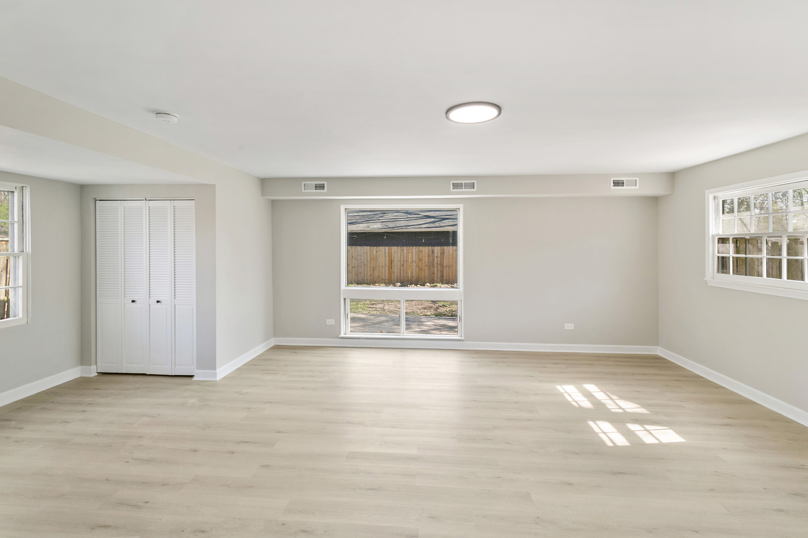 25 Long Beach Road Montgomery, IL 60538 - Photo 9 of 21 a view of an empty room with window and closet area