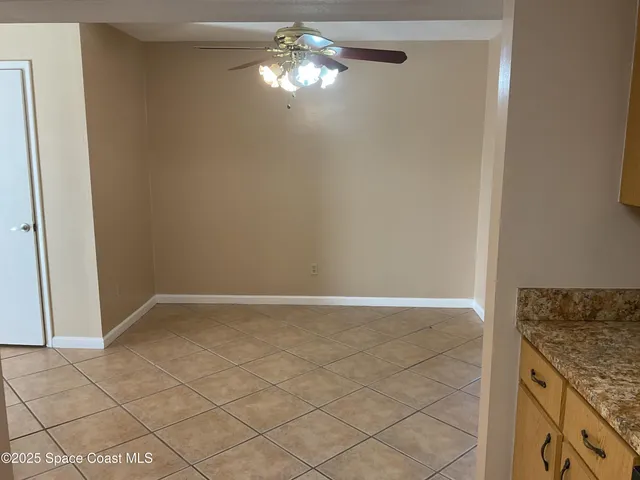 a view of kitchen and chandelier