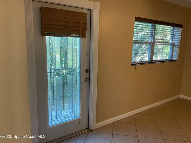 an empty room with window