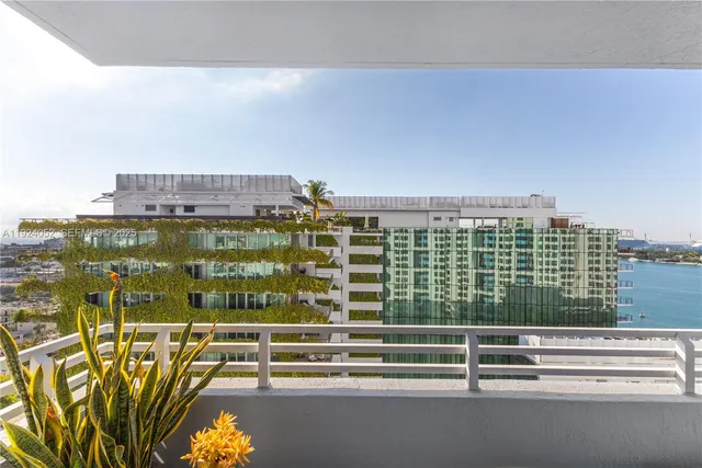 a view of a balcony with city view
