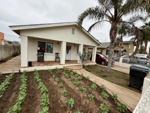 a house view with a outdoor space