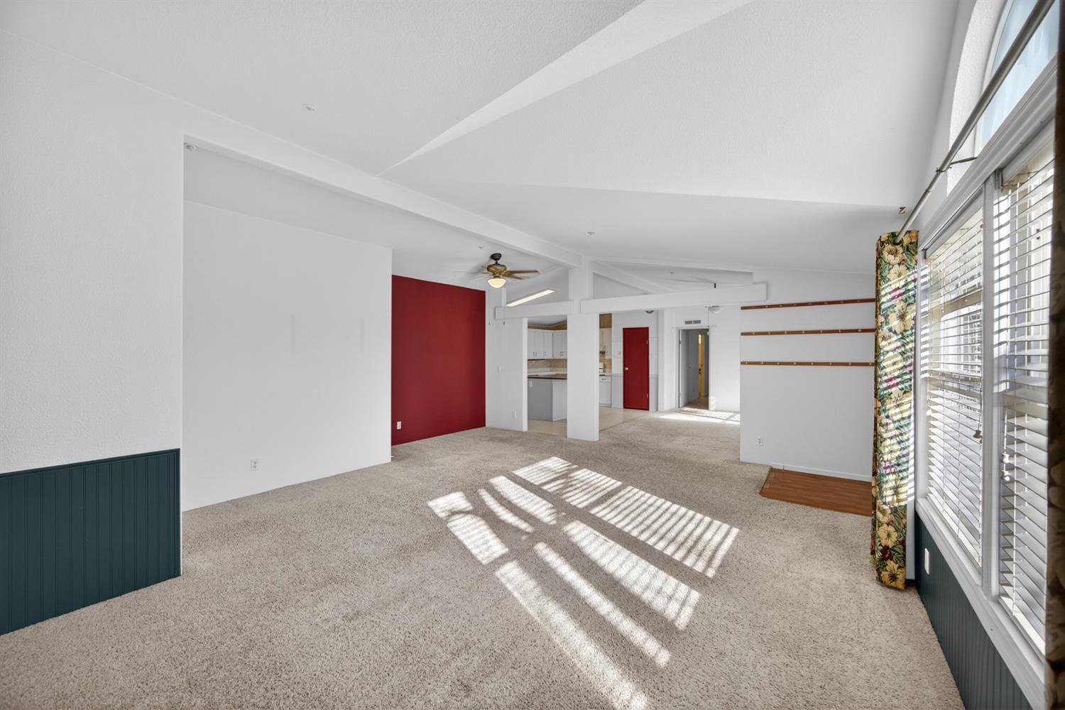 9708 La Clair Road Wilton, CA 95693 - Photo 11 of 60 a view of empty room with fireplace and windows