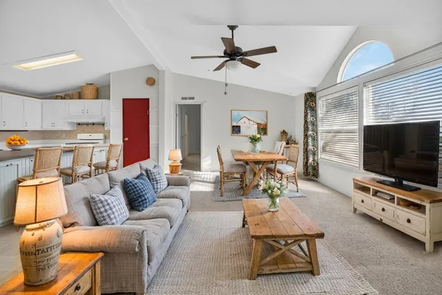 a view of a kitchen with a sink and cabinet area