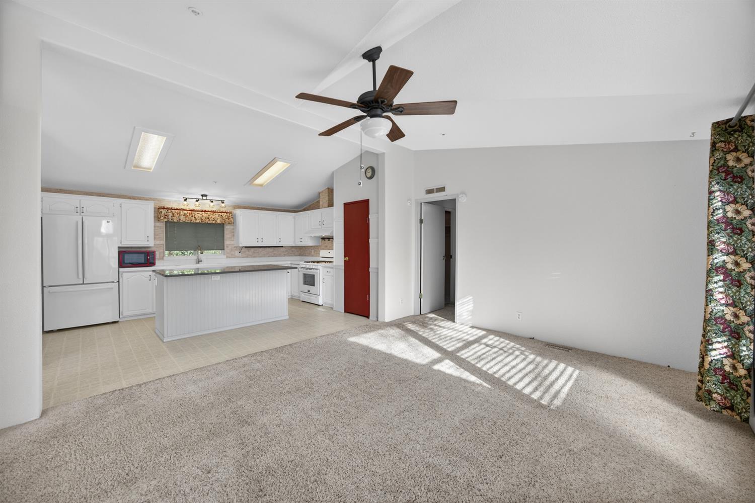 9708 La Clair Road Wilton, CA 95693 - Photo 19 of 60 a view of a kitchen with a sink and cabinet area
