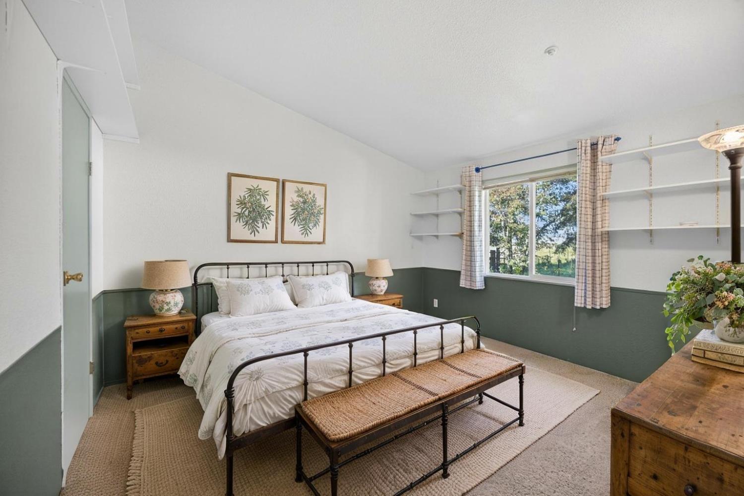 9708 La Clair Road Wilton, CA 95693 - Photo 34 of 60 a bedroom with a bed table and window