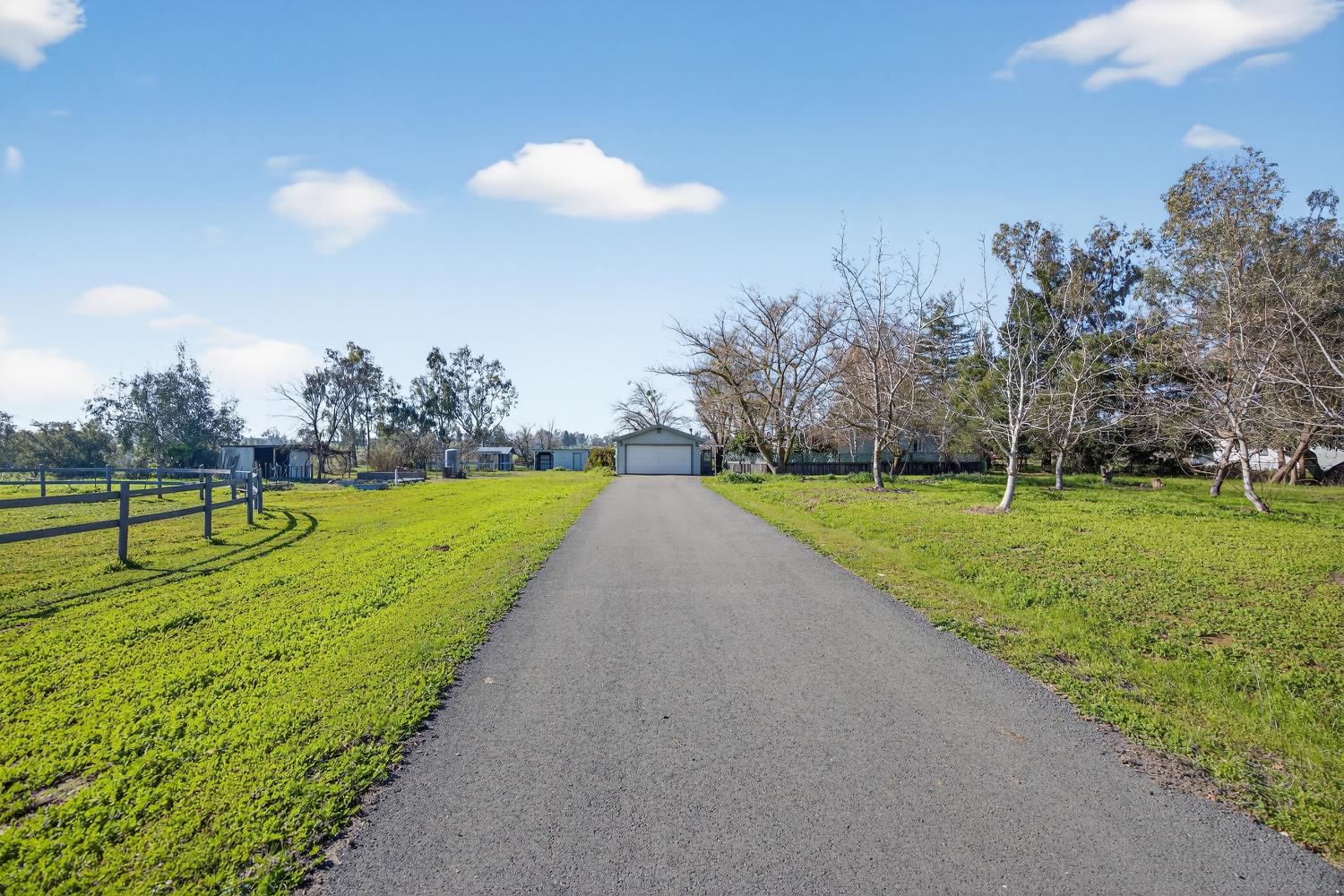 9708 La Clair Road Wilton, CA 95693 - Photo 4 of 60 a view of a park with large trees