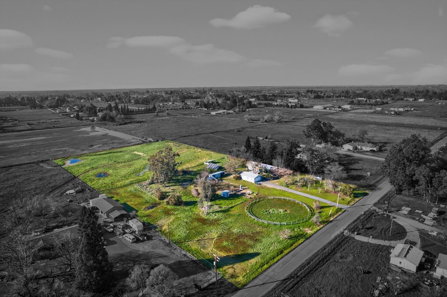 9708 La Clair Road Wilton, CA 95693 - Photo 58 of 60 an aerial view of a house with a swimming pool
