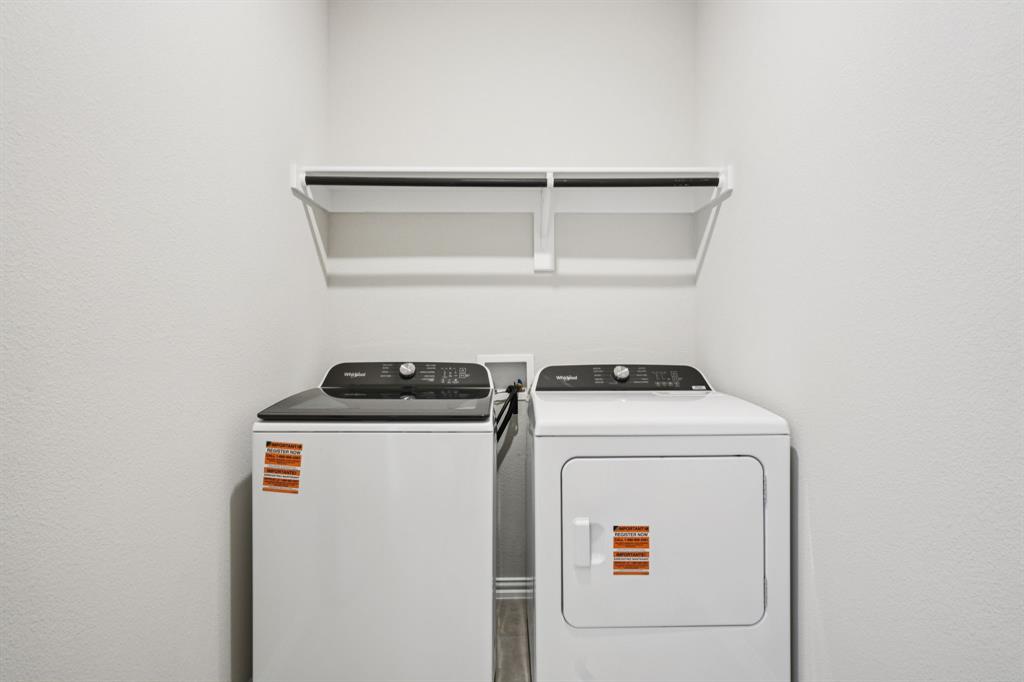 1632 Arches Road Anna, TX 75409 - Photo 14 of 29 a utility room with dryer and washer