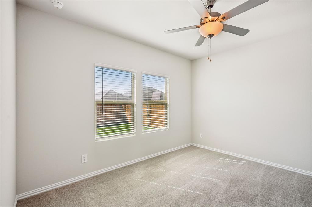 1632 Arches Road Anna, TX 75409 - Photo 15 of 29 a view of an empty room with a window