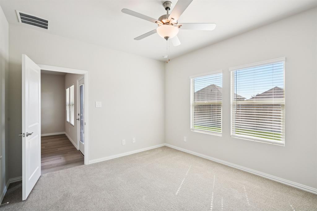1632 Arches Road Anna, TX 75409 - Photo 18 of 29 a view of an empty room with a window