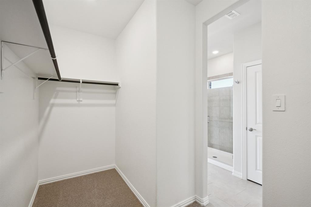 1632 Arches Road Anna, TX 75409 - Photo 22 of 29 a bathroom with a shower